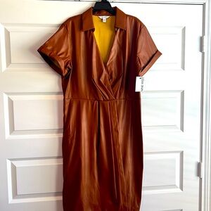 Short sleeve leather dress. New never worn. Light weight